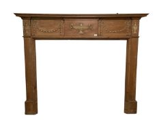 Pine fire surround, with raised Adam style frieze panel to top, CONDITION REPORT: No sign of