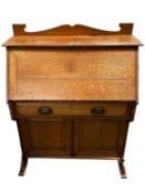 A narrow Arts and Crafts style desk