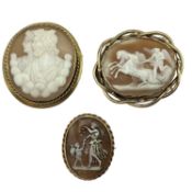 Three unmarked yellow metal mounted shell cameo broaches depicting classical scenes, largest 6cm x