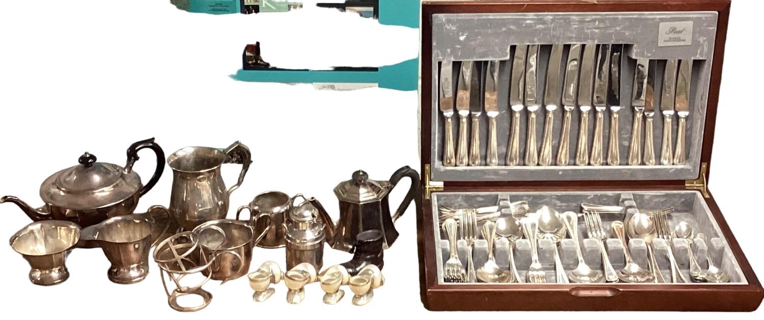 A collection of silver plated ware to include a boxed 8 person canteen of cutlery by Bead , Two