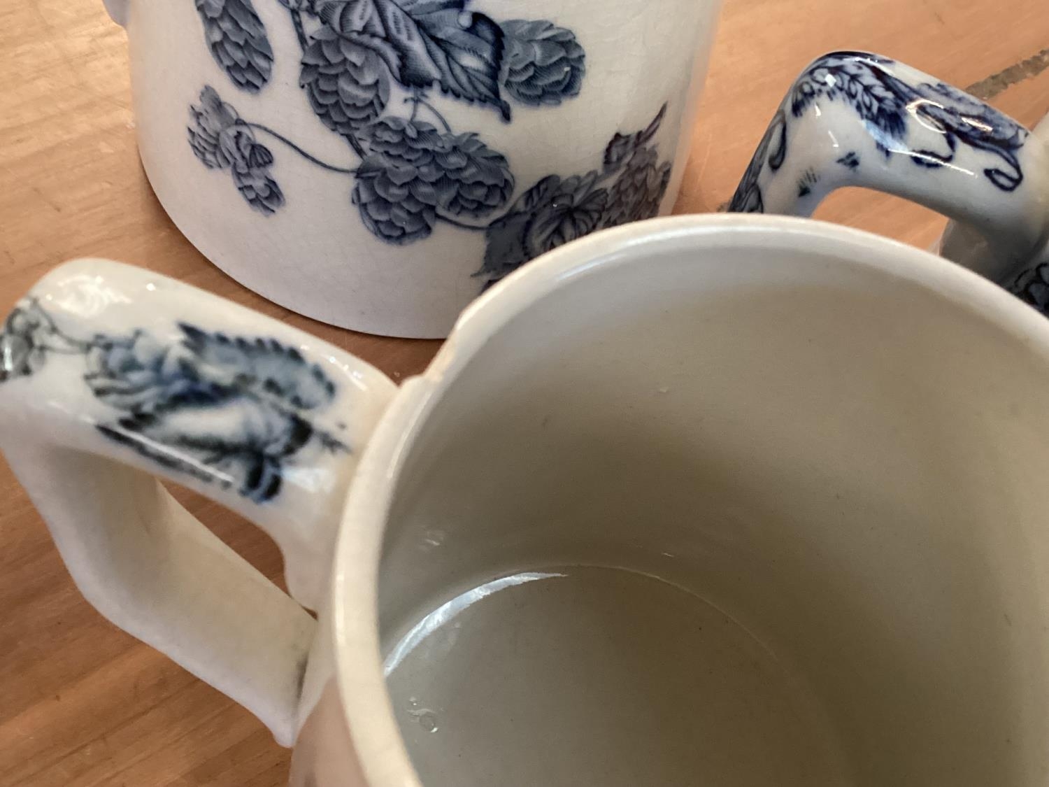A set of Staffordshire blue and white graduated jugs together and other items. - Image 7 of 12