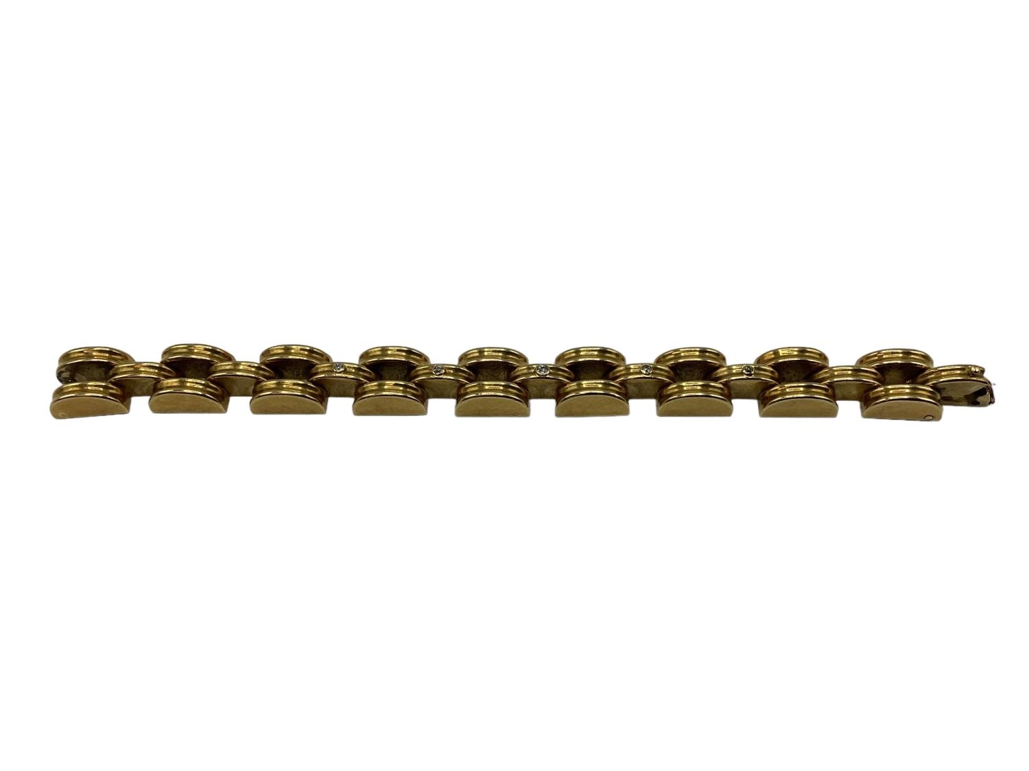 An unmarked yellow metal(tests 24ct approx) and diamond bracelet. Half moon links set with five - Image 5 of 6