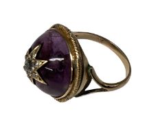 Late C19th/early C20th 9 ct gold amethyst and diamond ring, circular cabochon amethyst with