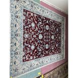 A large red ground Florentine patterned carpet 250 x300 x 310cm