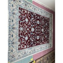 A large red ground Florentine patterned carpet 250 x300 x 310cm