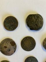 A collection of coins of Antiquity. Roman possibly Greek examples in bronze. Most heavily worn.