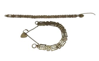 Two 9ct gold gate link bracelets with heart lockets. 9.04g.