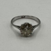 A platinum and single stone diamond ring. Old brilliant cut diamond. 2.25ct in an 8 claw setting,