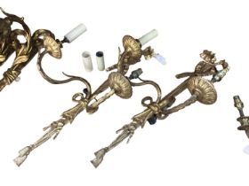 A quantity of decorative antique gilded wall sconces, (to include two pairs), see images for