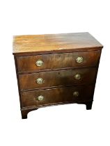 Victorian mahogany straight front three drawer chest of drawers, with brass drop handles, on bracket