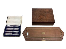 A boxed set of 6 sterling silver handled fruit knives, burr wood humidour, and a boxed carving