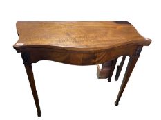 A light mahogany butterfly shaped front fold over tea table, on tapered legs, some minor general