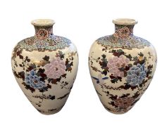 A pair of modern Oriental style baluster shaped vases. 34cm(h). In good order with light signs of