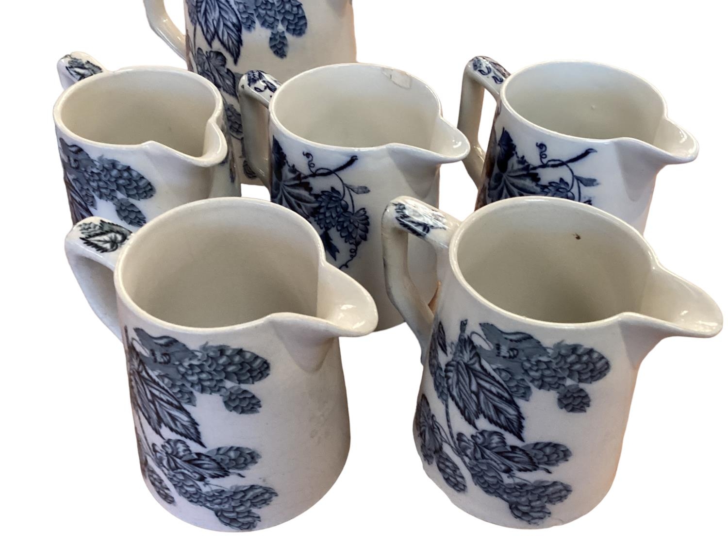 A set of Staffordshire blue and white graduated jugs together and other items. - Image 12 of 12