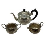 A South Asian style three piece tea set marked sterling silver to base, total 300g.