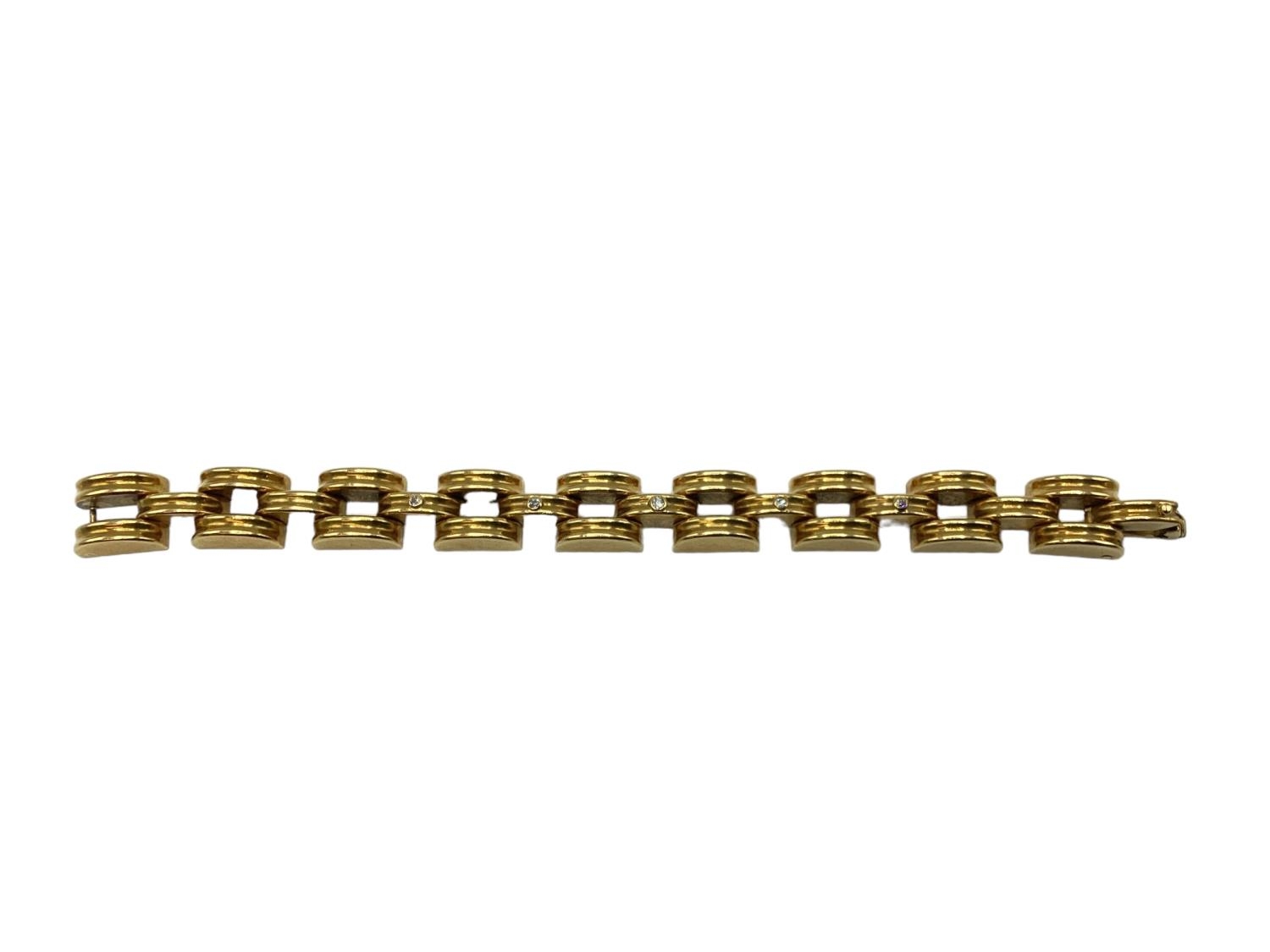 An unmarked yellow metal(tests 24ct approx) and diamond bracelet. Half moon links set with five - Image 6 of 6
