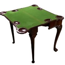 Mahogany fold over card table, with shaped top to tapering legs and paw feet, CONDITION REPORT: No