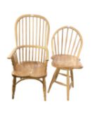 Two modern light coloured Windsor style arm chairs