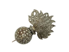 An unmarked yellow metal artillery sweethearts broach set throughout, with rose and single cut