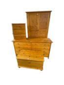 A quantity of modern pine furniture, wardrobe, side drawers, trunk, and side drawers, all as