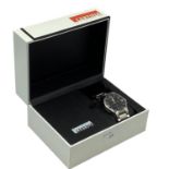 A Certina DS Spel automatic wristwatch. Stainless steel case with black 34mm face with Arabic and