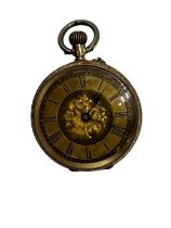 A 14ct gold ladies pocket watch, gold face with Roman numeral markers. 8.7g.,