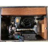 Singer Sewing Machine in black metal trunk, electric. As found, clearance lot, see images