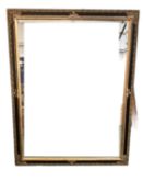 A large rectangular gilt framed wall mirror 108cm W overall x 138 cm high overall