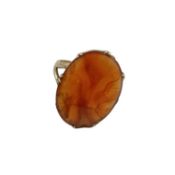 An unmarked yellow metal carnelian set dress ring. 2.55g. Size P