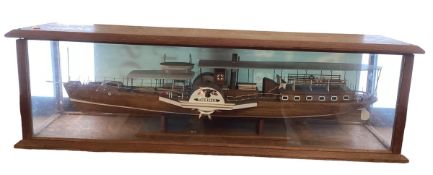 A large wooden and glass cased model of a Norweigan Paddle Boat, 97cm Long