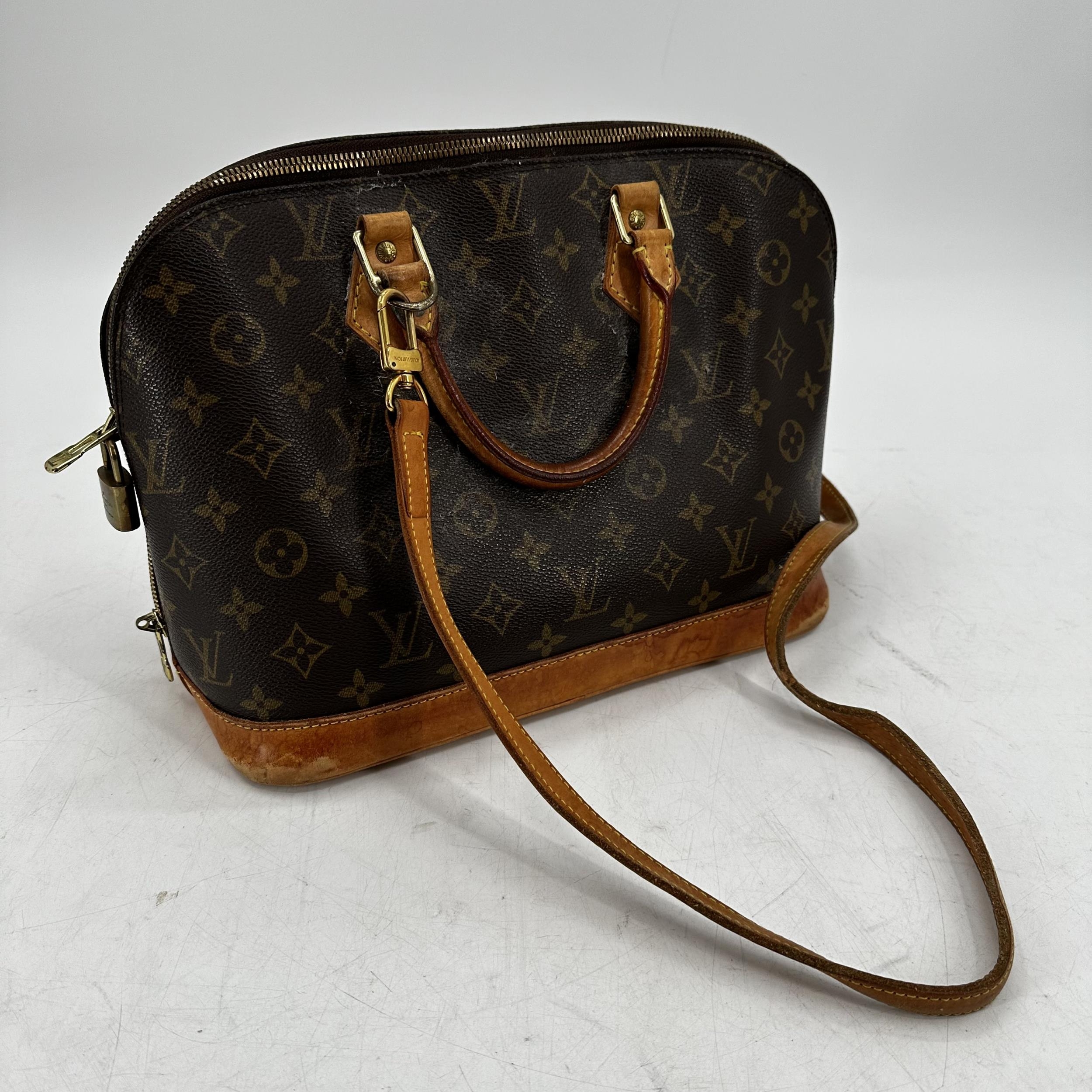 LOUIS VUITTON handbag, condition - used condition, all over wear and staining to leather and wear to