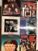 18 (approx) Queen Vinyl records. Varying condition. See photos for more details