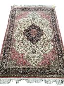 Tabriz style silk rug, red and olive ground with floral motifs and border 210 cm x 320 cm
