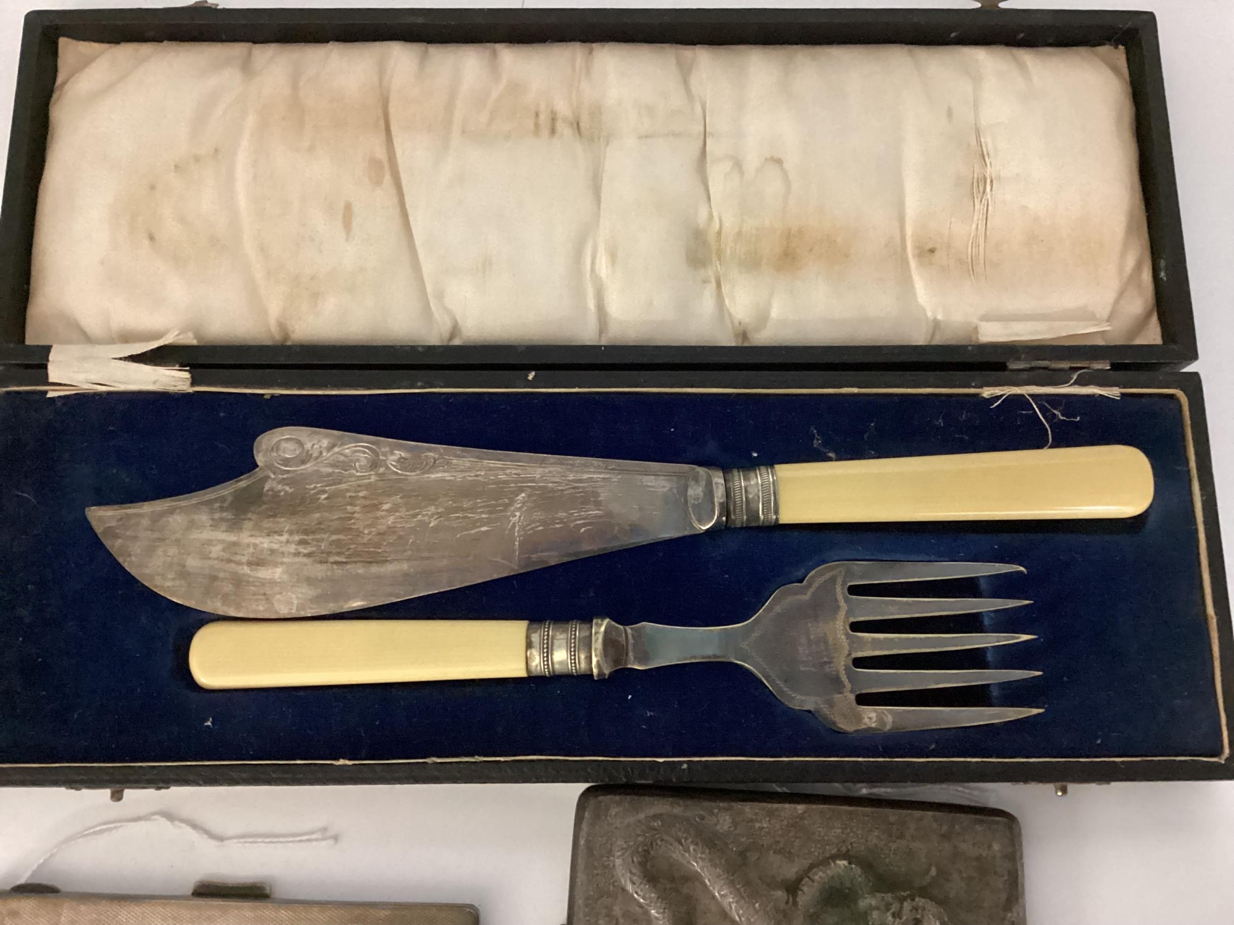 A cased fish knife and fork, a hallmarked silver cigarette case, and another cigarette case, all - Image 6 of 8