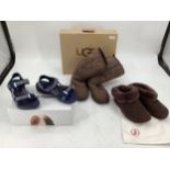 Brown sheepskin UGG boots, size 6 , worn, some fading with box; pair of brown sheepskin fitflop size