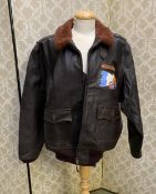 A gents leather jacket labelled: BUAER US Navy G-1 Flight Jacket, Eastman leather clothing, size 46,