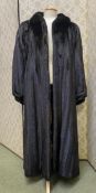 A ladies long black fur coat, labelled Grosvenor Canada at Zwirn, in good condition