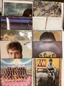 10 (approx) various vinyl records, to include. Paul Mcartney, John Lennon, The Beatles. Varying