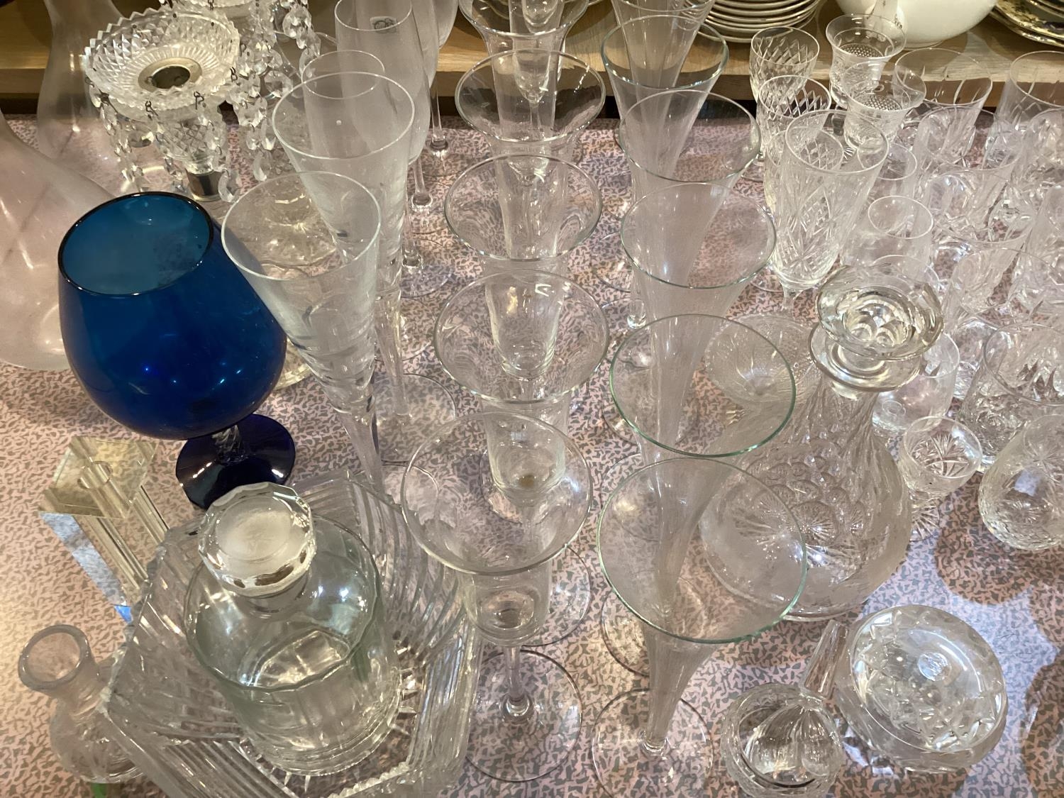 A quantity of glassware to include decanters, candlesticks , champagne glasses, tumblers etc - Image 4 of 5