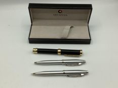 A cased pair of Sheaffer pen set and unusual pen shaped magnifying glass