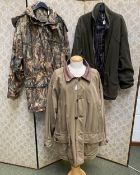 Three sporting country coats: A Deerhunter camouflage jacket, A Barbour Fleece jacket XL, and a