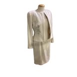 Catherine Walker, London. Cream wool dress and jacket, black silk skirt, beige three quarter