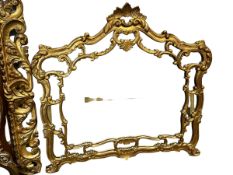 A large decorative gilt wall mirror, in the Rococo style, overall 115cm High x 123cm Wide