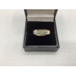 A Large 9ct gold ring with 3 stones, size V/W, total weight 5.3grams