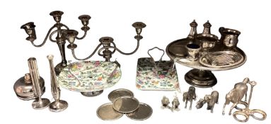 A collection of silver plated wares to include candelabra, Taza, model horses etc