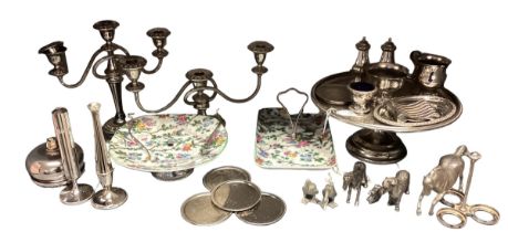 A collection of silver plated wares to include candelabra, Taza, model horses etc