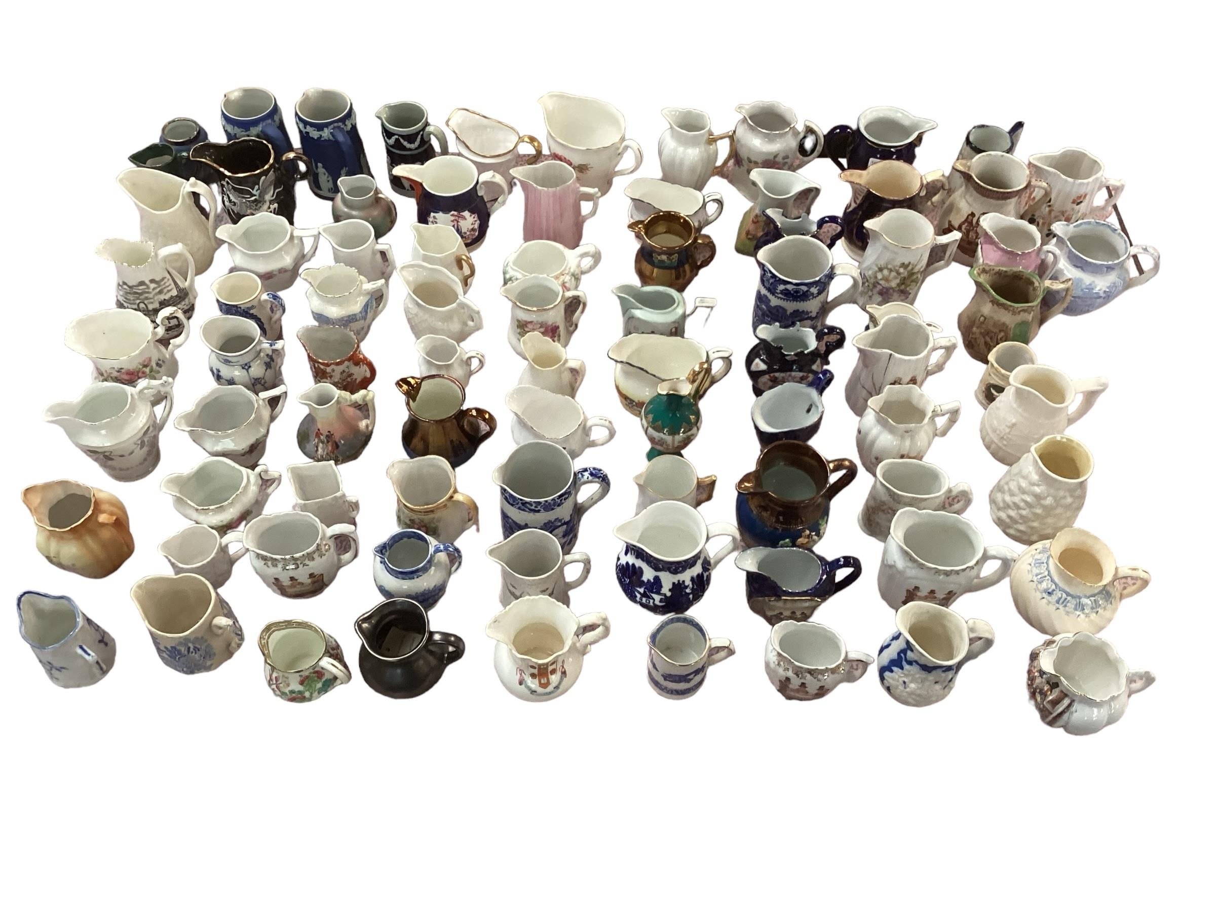 A large collection of late C19th and C20th ceramic and pottery jugs, all as found