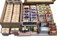 A collection of boxed and unboxed die cast model cars, mostly with advertising livery. Oxford Die
