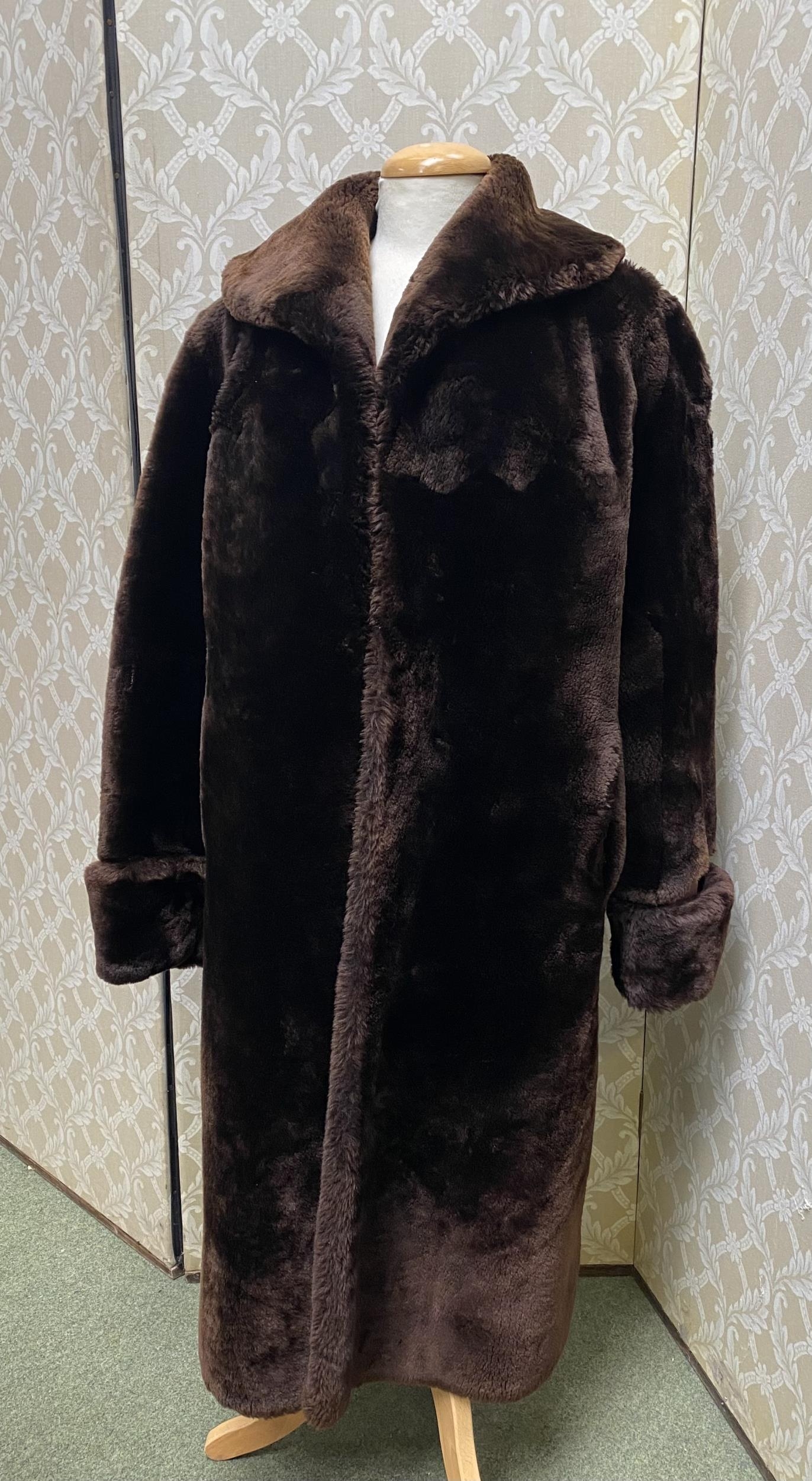 A vintage Tescan "fur skins" brown three quarter length coat, condition, been used but no sign of