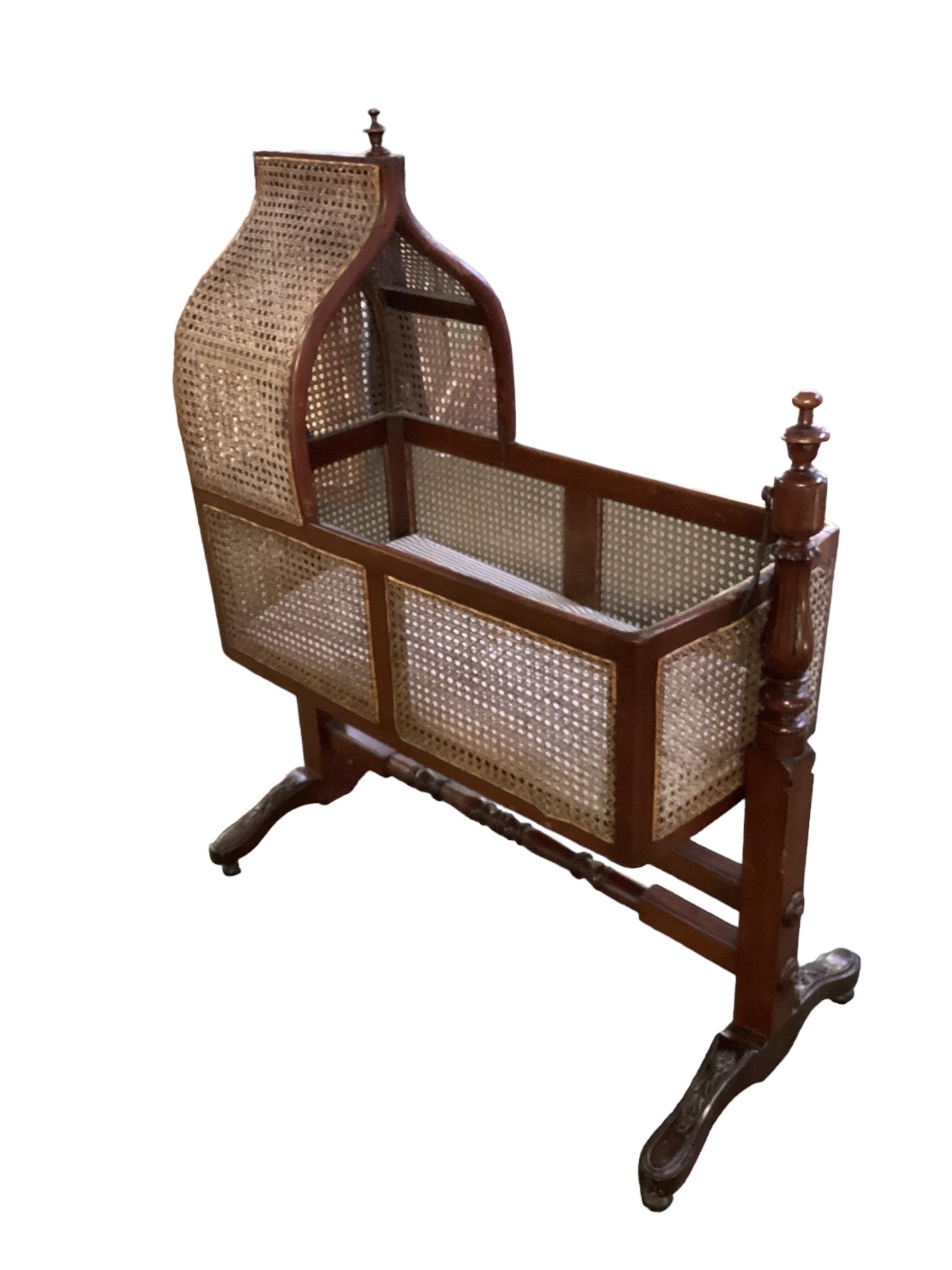 Victorian mahogany Crib on stand, some wear to bergere at one end